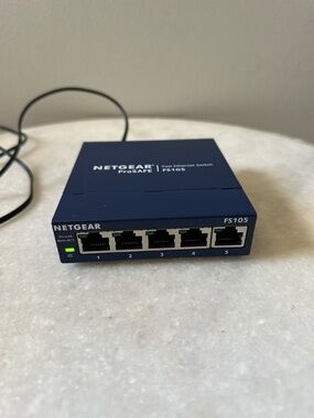 NETGEAR FS105 ProSafe Fast Ethernet Switch 5 Port 10/100 Mbps with Power Adapter